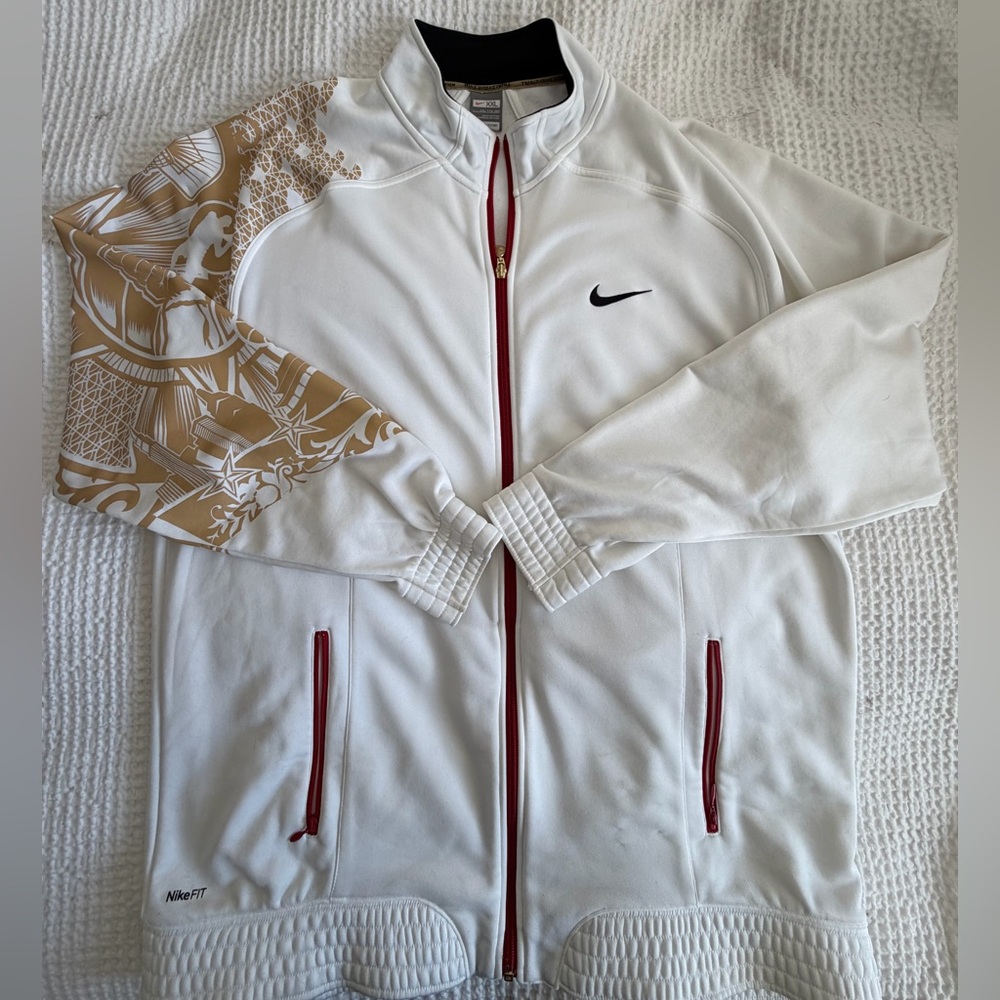 Nike White Jacket with Gold and Red Accents